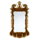 A George II walnut and gilt-wood framed wall mirror,