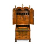 A Queen Anne walnut double dome bureau bookcase,