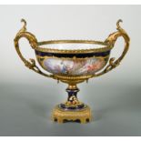 A late 19th century porcelain and gilt metal mounted two-handled pedestal bowl,