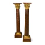 A pair of 19th century ormolu mounted rouge marble columns,