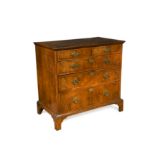 A George I walnut chest of drawers,