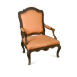 A Louis XV carved walnut armchair,