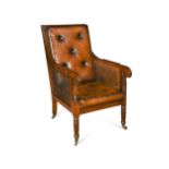 A late Regency style mahogany library chair,