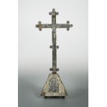 An 18th century Southern European carved mother of pearl and ebonised wood crucifix,