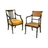 A Regency ebonised and parcel gilt open armchair with cane seat and back,