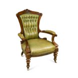 A mid-Victorian walnut framed armchair,