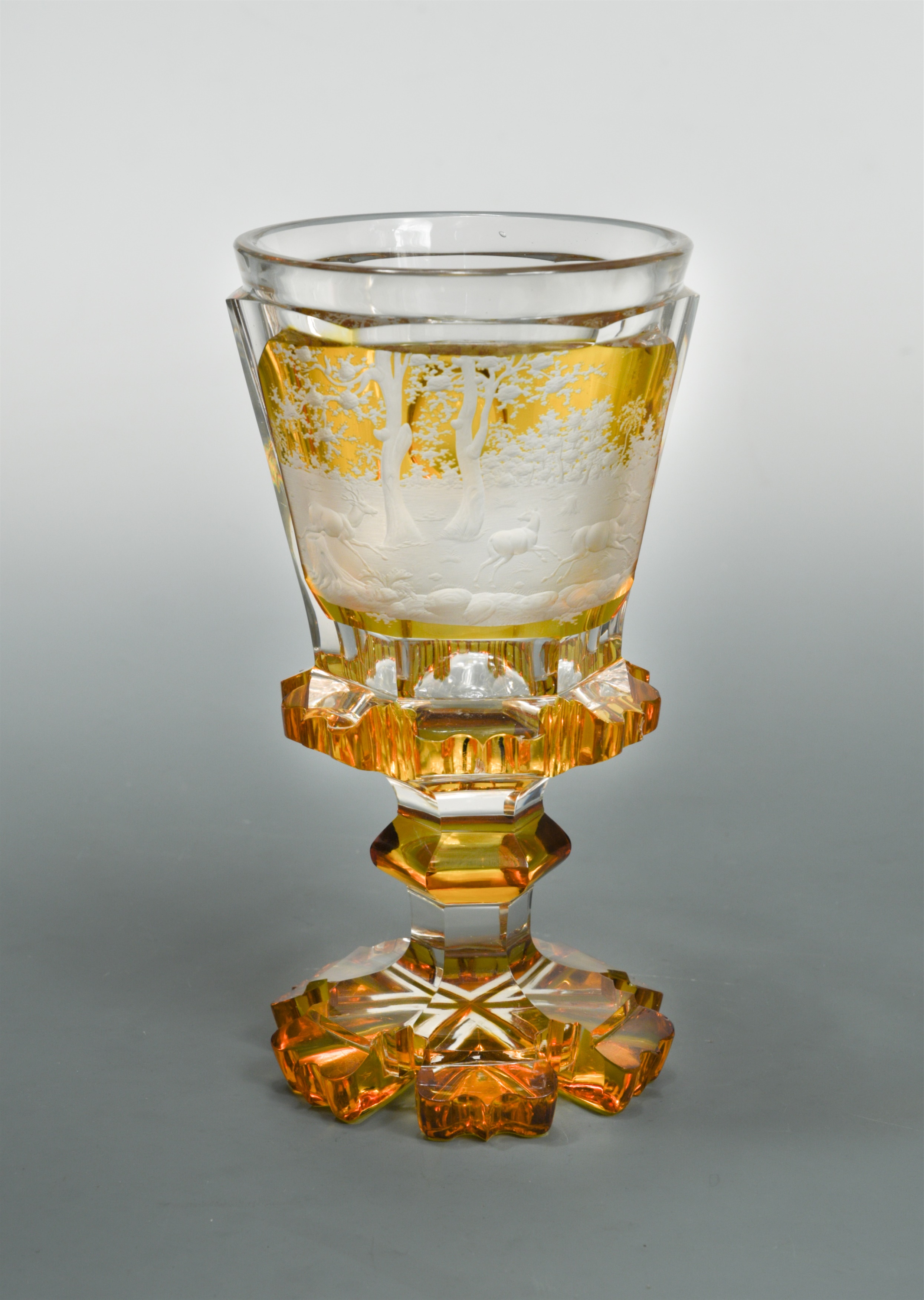 A 19th century Bohemian amber glass goblet,