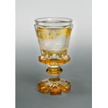A 19th century Bohemian amber glass goblet,
