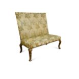 A George I walnut framed upright settee,