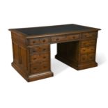 A George IV oak pedestal desk,