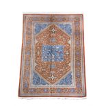 A small North West Persian silk rug,