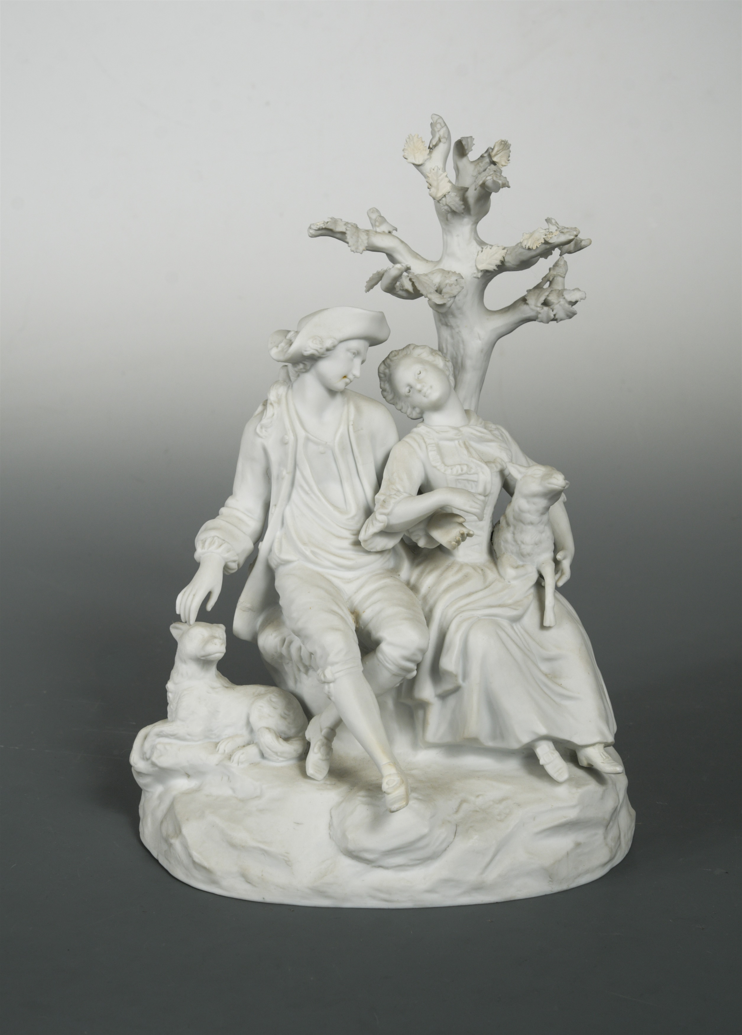 A bisque porcelain figure group, possibly Sevres,