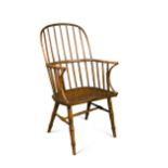 An 18th century ash & elm comb back chair,