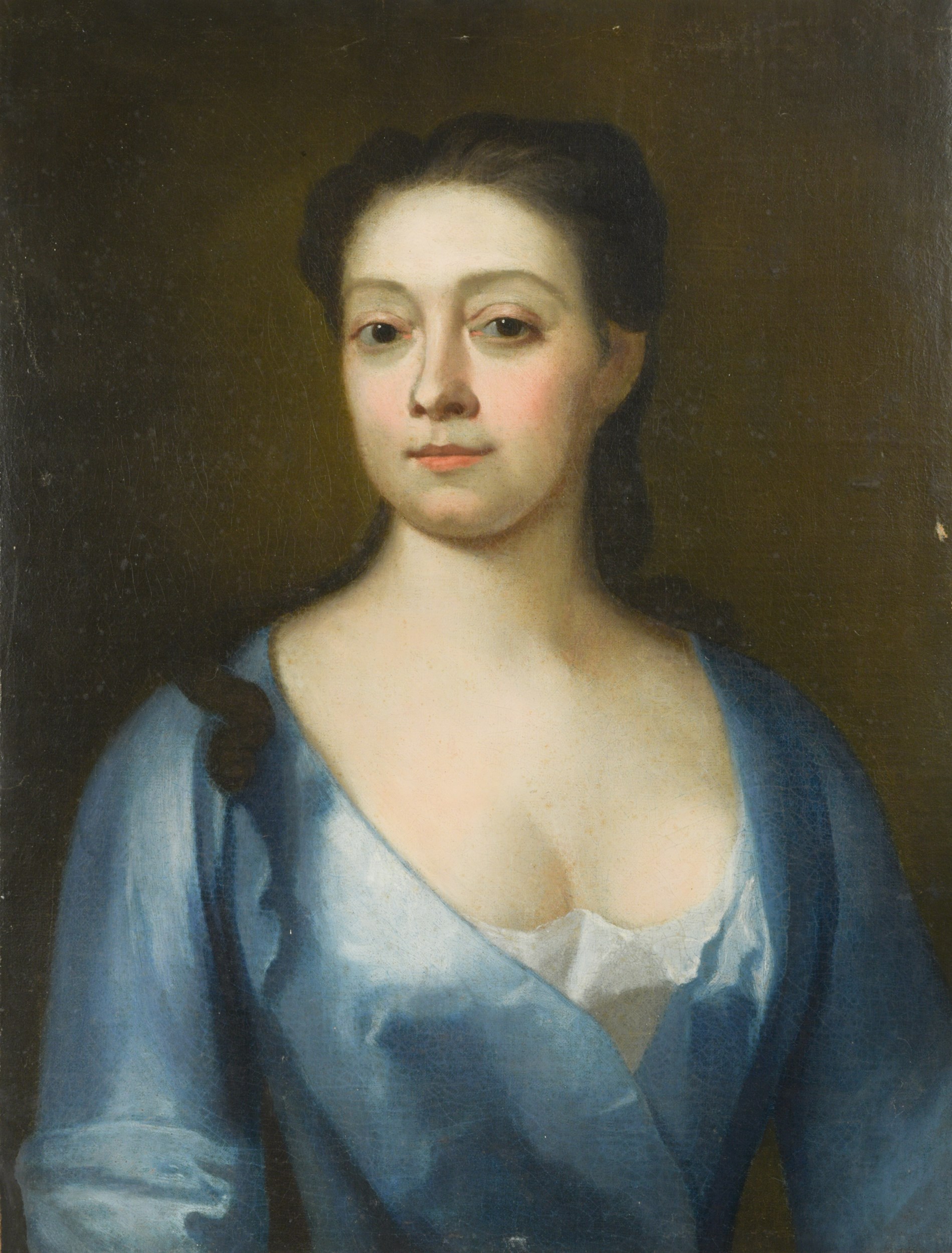 English School, 18th Century Portrait of a lady, seated, in a blue dress with cream fichu, and her