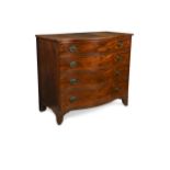 A George III mahogany serpentine chest of drawers,