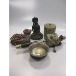A collection of Tibetan and Buddhist items, including a Tibetan prayer wheel, faux coral inlaid