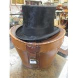 A silk top hat by Austin Reed Ltd, Regent St, probably size 7 (cased)