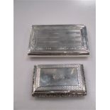 A silver miniature diary case with pencil, together with a silver folding card case with silk