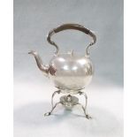 A George V silver bullet shaped tea kettle and stand,