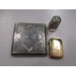 A silver cigarette case, together with an unusural silver gilt vesta, and a novelty pepper caster in