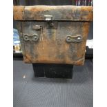 A leather travelling trunk together with a metal strong box