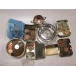 A silver two handled bowl, two silver cigarette cases, a silver metal ashtray inset with a