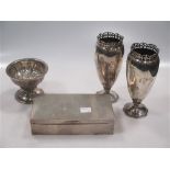 A pair of silver vases,
