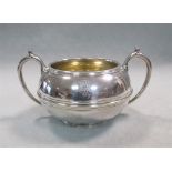 A George V silver sugar bowl by Garrard & Co,