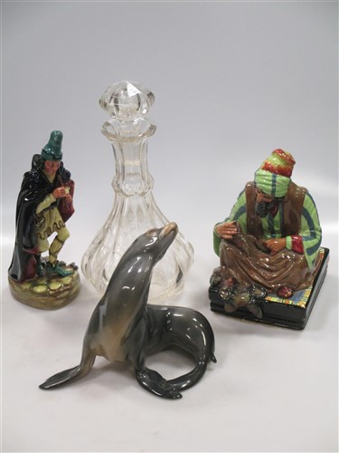 A Bing and Grondahl figure of a seal, marked 1733, 20 x 18 cm; together with two Royal Doulton