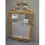 A Louis XVI gilt framed wall mirror with leaf cresting, 107cm high - Bonhams 23rd November 2004