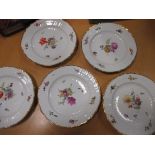 A set of sixteen continental porcelain plates painted with flowers