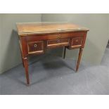 A 19th century French mahogany desk, of three drawers on column legs 74 x 85 x 49cm