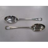 A pair of silver basting spoons,