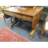 A 19th century sofa table, the frieze fitted with two drawers, on lion paw feet, 150 x 81 x 73cm