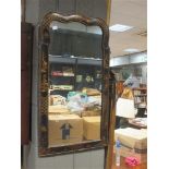 A Chinoiserie style lacquered mirror 80 x 43cm