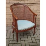 An Edwardian painted satinwood bergere,