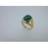 A signet ring set with jade,