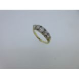 An Edwardian five stone diamond ring,