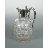 A Victorian silver topped cut glass claret jug,