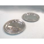 A pair of Peruvian metalwares dinner plates,