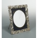 A Chinese export metalwares easel back photograph frame,