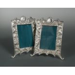 A pair of Chinese export metalwares easel back photograph frames,