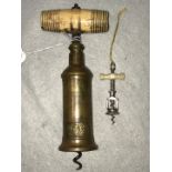 A Victorian bronze barrel corkscrew