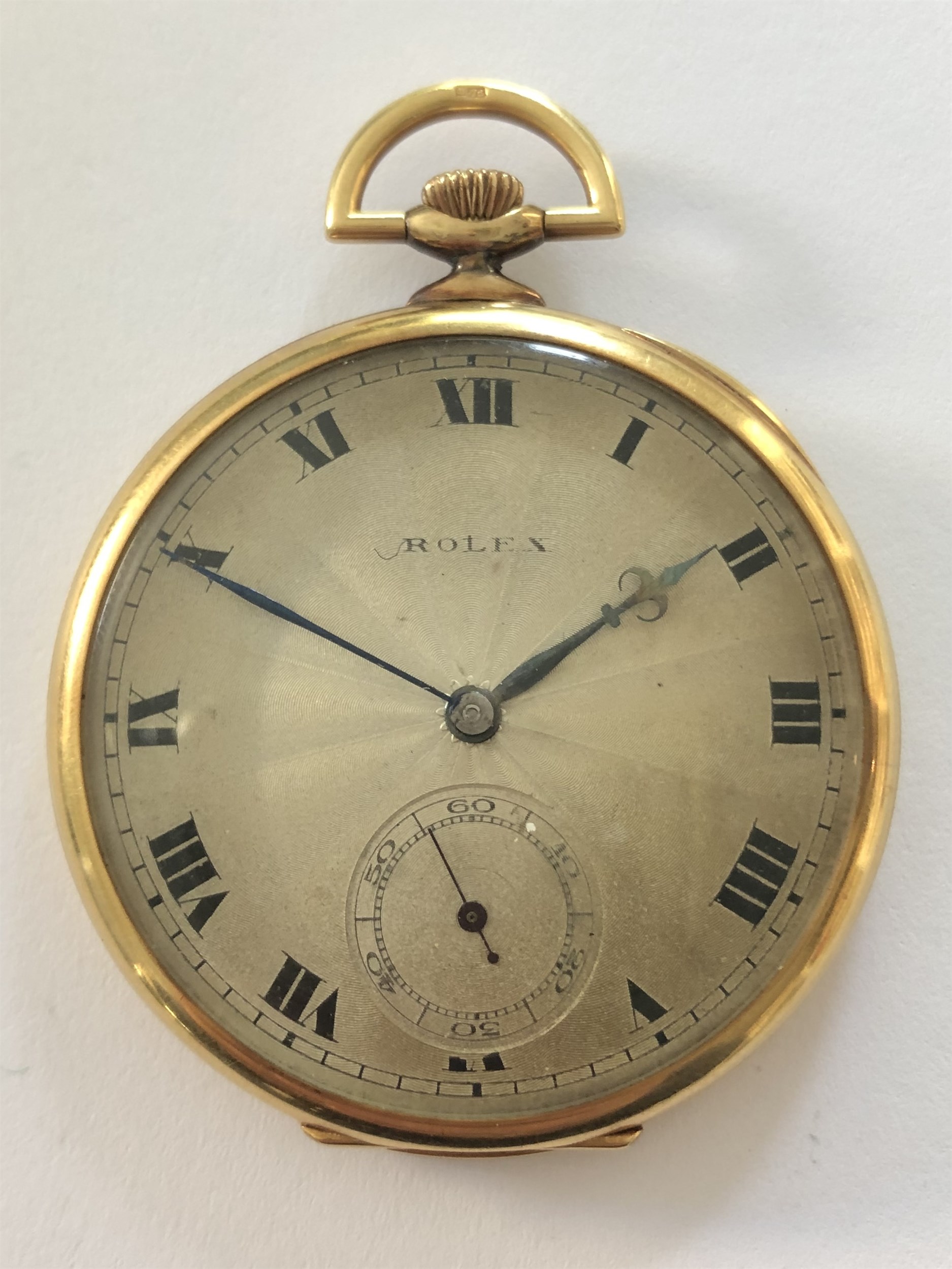 Rolex - A George V 18ct gold open faced dress pocket watch,