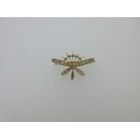 A diamond set moth brooch,