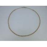 A 9ct gold fancy link chain necklace by Unoaerre,