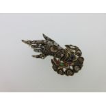 A diamond and gem set hand and cuff brooch,