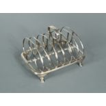 A George IV silver toast rack,