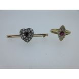 A Victorian diamond and ruby navette ring and a diamond and ruby heart brooch,