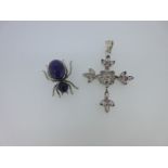 An amethyst pendant cross together with an amethyst set spider brooch,